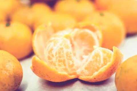Fresh mandarin oranges background, clean tangerine close up. Stock Photos
