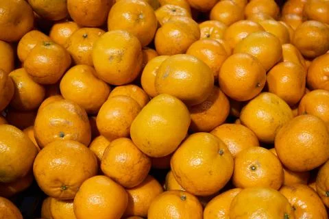 Fresh mandarin oranges texture. Background with close-up shooting Stock Photos