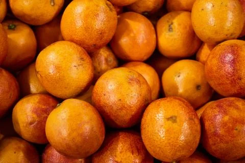 Fresh mandarin oranges texture. Background with close-up shooting Stock Photos