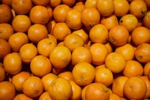 Fresh mandarin oranges texture. Background with close-up shooting Stock Photos