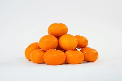 Fresh mandarin oranges on white background. Stock Photos