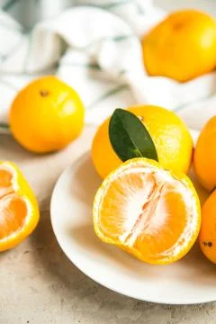 Fresh mandarin tangerines on table Stock Photos