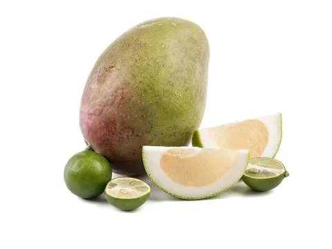 Fresh mango and lime fruit with slices on white background 写真素材