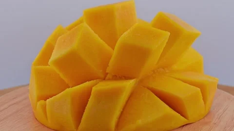 Fresh mango cube slices. Zoom out. Stock Footage 310249336