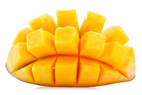 Fresh mango cut into cubes on a white background Stock Photos