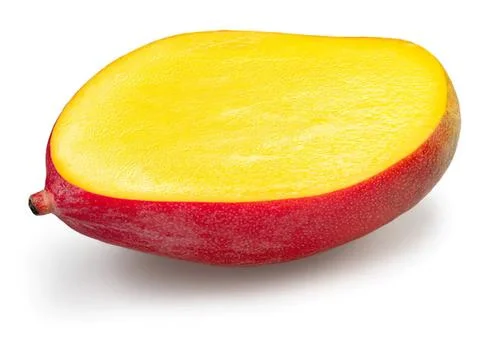Fresh mango cut in half showing yellow flesh Stock Photos