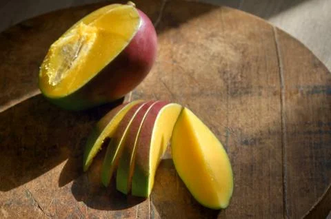 Fresh Mango Fruit On Table Stock Photos