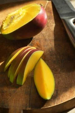 Fresh Mango Fruit On Table Stock Photos