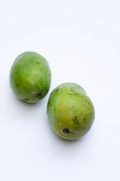 Fresh mango fruit on a white background, highlighting its vibrant yellow co.. Stock Photos