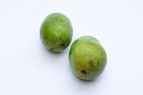 Fresh mango fruit on a white background, highlighting its vibrant yellow co.. Stock Photos