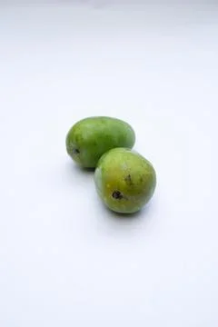 Fresh mango fruit on a white background, highlighting its vibrant yellow co.. Stock Photos