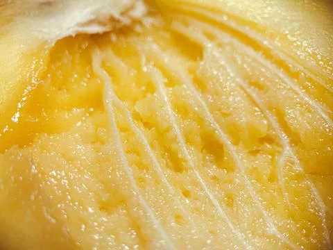 Fresh mango macro. The fruit pit is visible in detail Stock Photos