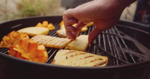 Fresh mango, pineapple slices and a wheel of brie cheese in a ramekin being Stock-Footage 159607929