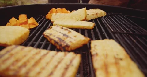 Fresh mango, pineapple slices and a wheel of brie cheese in a ramekin being Stock-Footage 159608133