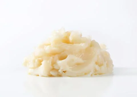Fresh mashed potatoes on white surface Stock Photos