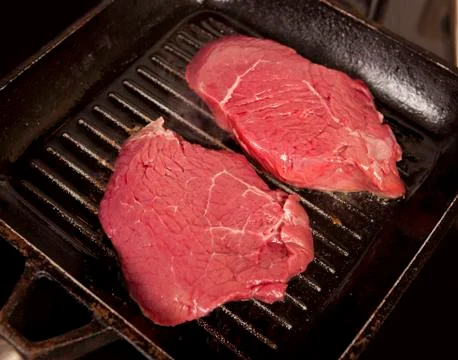 Fresh meat in pan Stock Photos