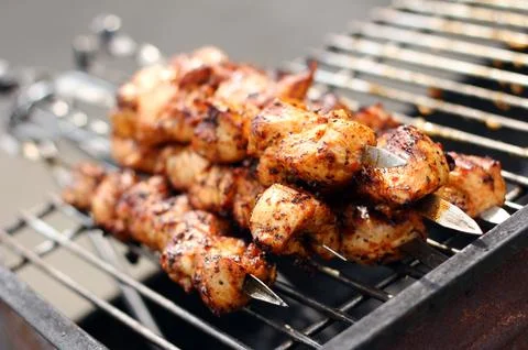Fresh meat prepared on fire Stock Photos