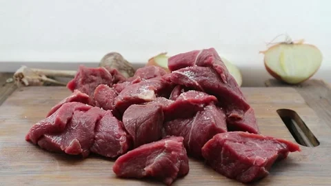 Fresh meat is sprinkled with salt Stock Footage 149748954