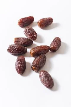 Fresh Medjool Dates on White Background Stock Photos