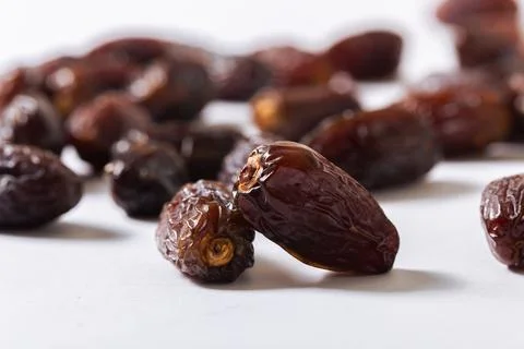 Fresh Medjool Dates on White Background Stock Photos