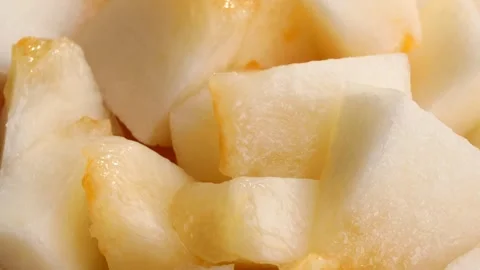 Fresh melon pieces, rotation in circle. slices of ripe juicy melon Turning. Stockbeeldmateriaal 252797375