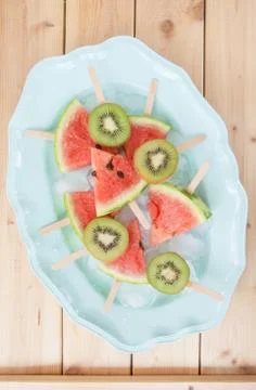 Fresh melon popsicles Stock Photos
