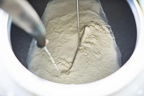 Fresh milk being prepped for processing. High angle shot of unprocessed milk Foto stock