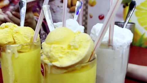 Fresh Milkshake and Fruit Juice Served with Ice Cream Stock Footage 344554951