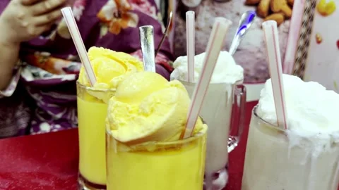 Fresh Milkshake and Fruit Juice Served with Ice Cream 動画素材 344554957