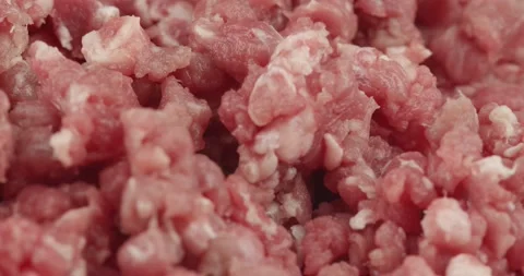 Fresh minced ground beef closeup rotating Stock Footage 146021933
