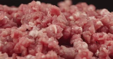 Fresh minced ground beef closeup rotating Stock Footage 148267180