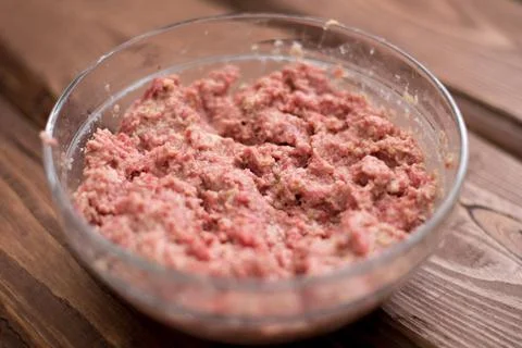 Fresh minced meat with bread for making meatballs. Stock Photos