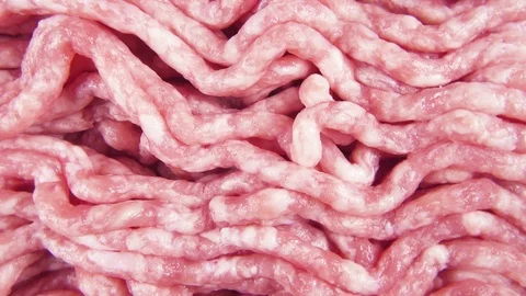 Fresh minced rotating background top view Stock Footage 101592938
