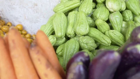 Fresh mix fruit focus bitter melon close up and focus moving left to right fo Stock Footage 119371930
