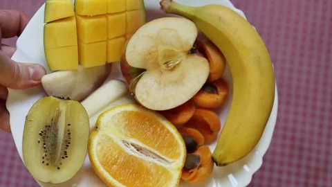 Fresh mixed fruit prepared for a healthy vitamin rich snack Stock Footage 340221463