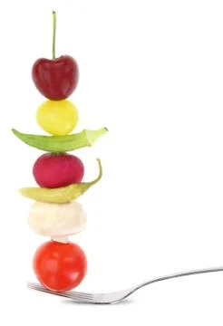 Fresh mixed vegetables on fork Stock Photos