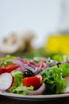 Fresh mixed vegetables salad. Selective focus Stock Photos