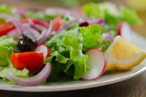 Fresh mixed vegetables salad. Selective focus Stock Photos