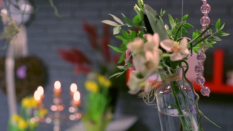 Fresh modern interior decoration design with candle holder and flouristic Stock Footage 74399151