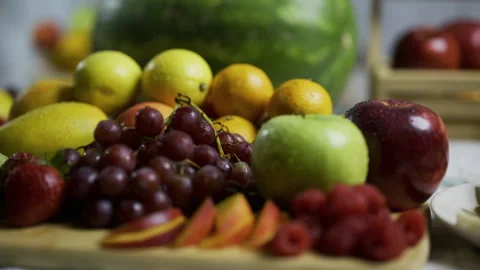 Fresh, moist, delicious fruit on kitchen counter - closeup tracking shot Stock Footage 341186499