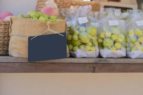 A fresh monkey apple with blank label produce displayed for sale at a local.. Stock Photos