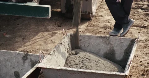 Fresh mortar, construction site in full swing, mortar flow, mortar for masonry Stock Footage 130367824