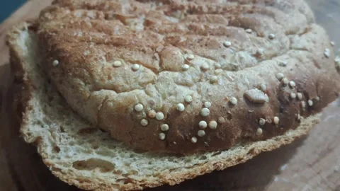 Fresh multigrain bread bun top view motion video clip animation Stock Footage 339249036