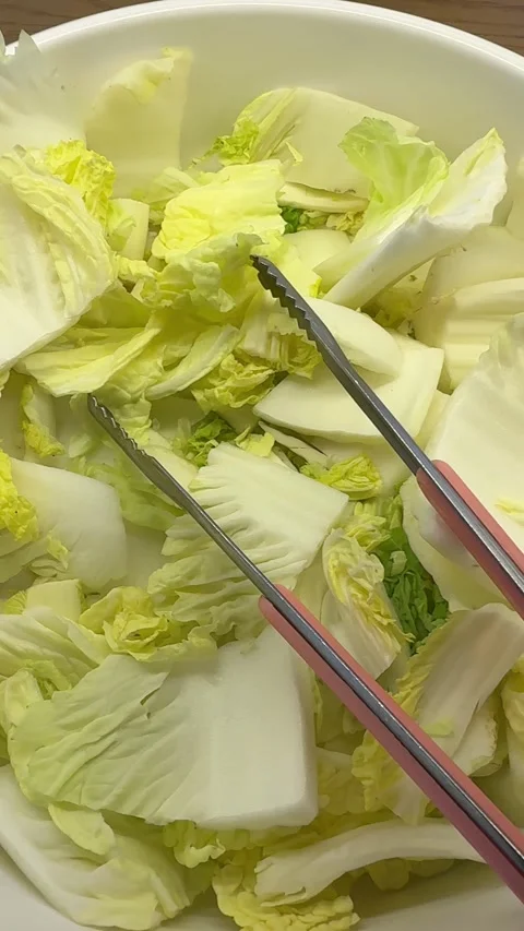 Fresh Napa Cabbage at an Asian Buffet Stock Footage 345398715