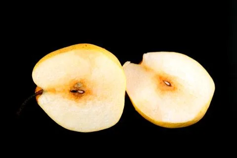 Fresh nashi pear and  cut on black background Stock-Fotos