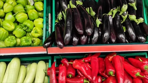 Fresh natural vegetables, red tomatoes, green cucumbers, peppers Stock Footage 310099212
