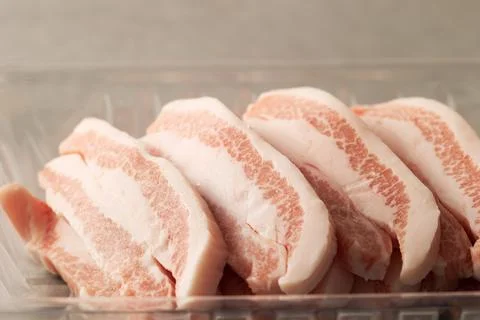 Fresh neck meat in packaging container Stock Photos