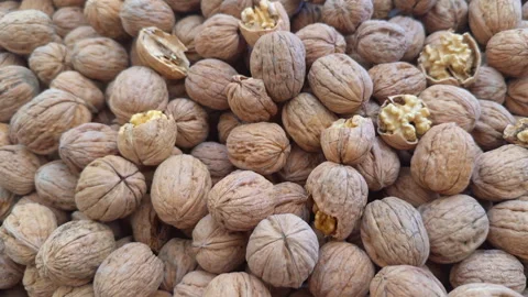 Fresh New Crop Large Walnuts on the Market Counter Stock Footage 322552450