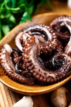 Fresh octopus on a plate. Stock Photos