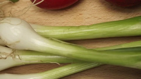 Fresh onion chive on kitchen board 4K Stock Footage